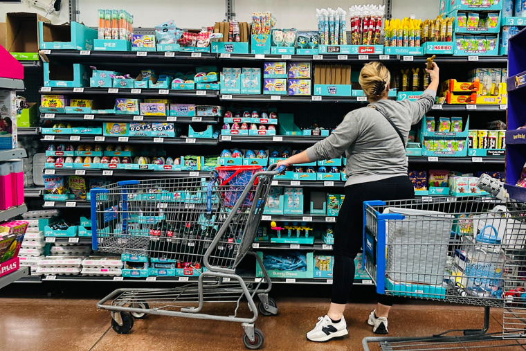 A woman shops at a Walmart.